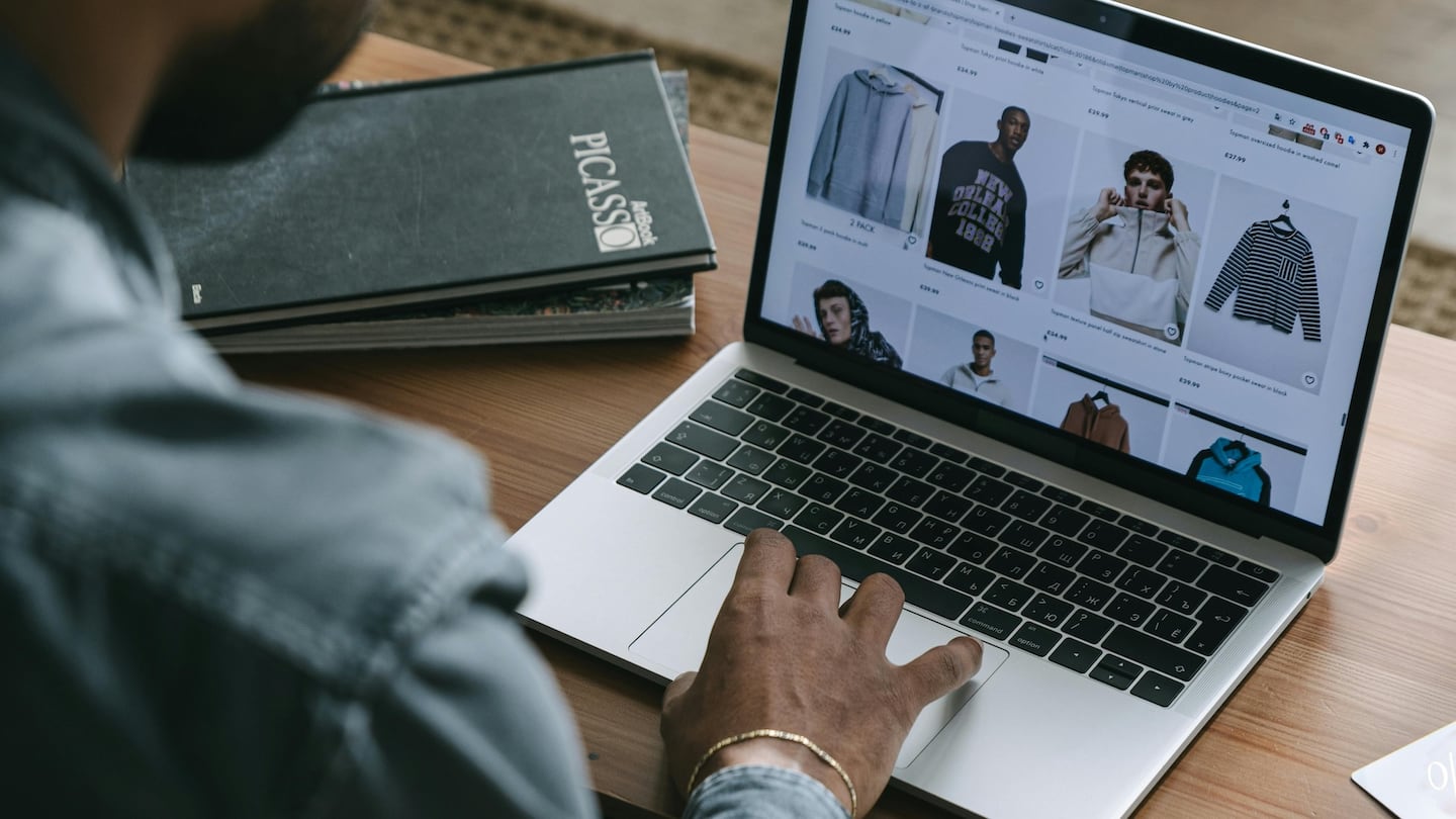 Individual online shopping on their laptop.
