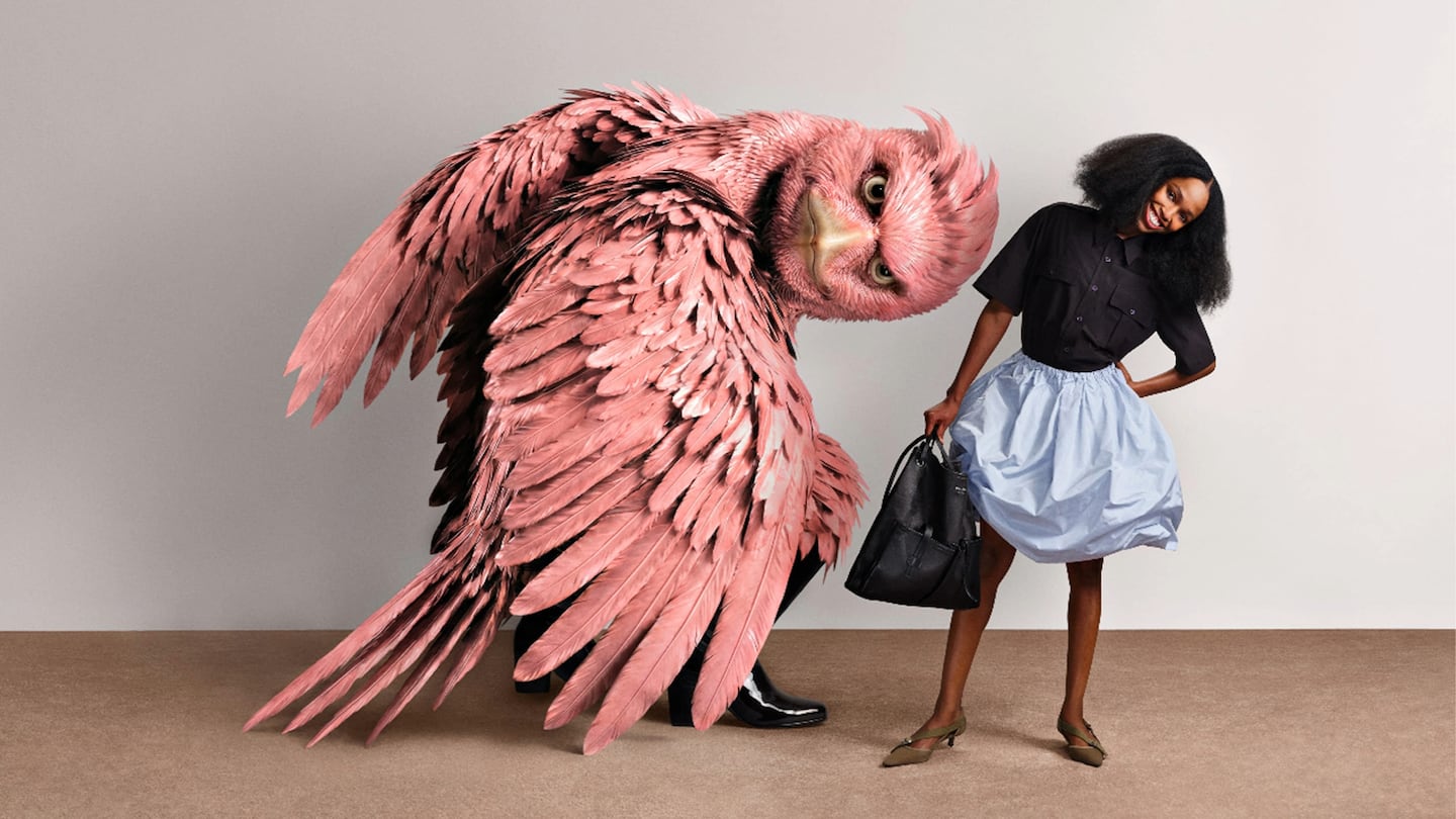 A large, pink bird-like creature and a model wearing Prada both lean to the side in similar poses.